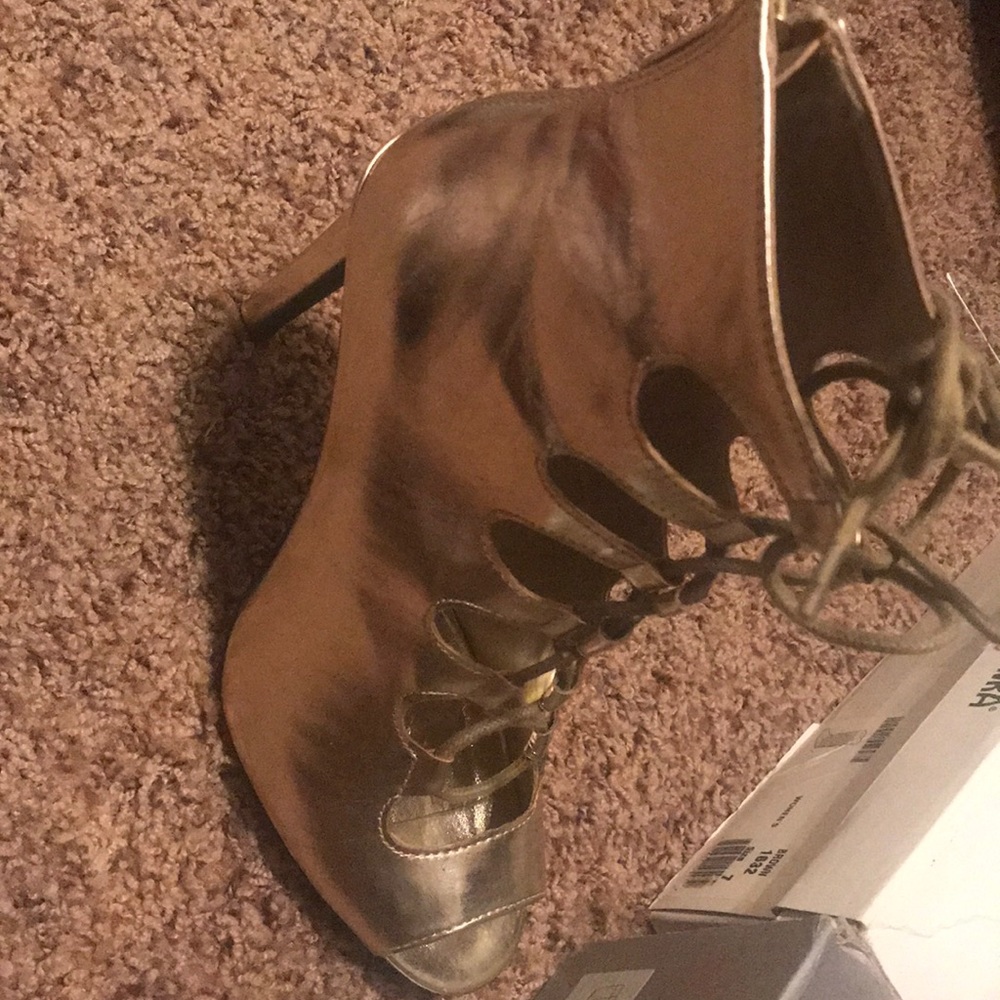 Gold high heels